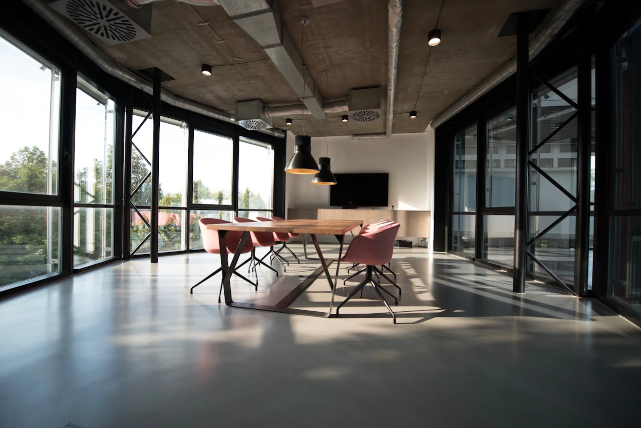Glass-walled meeting space (illustrative)